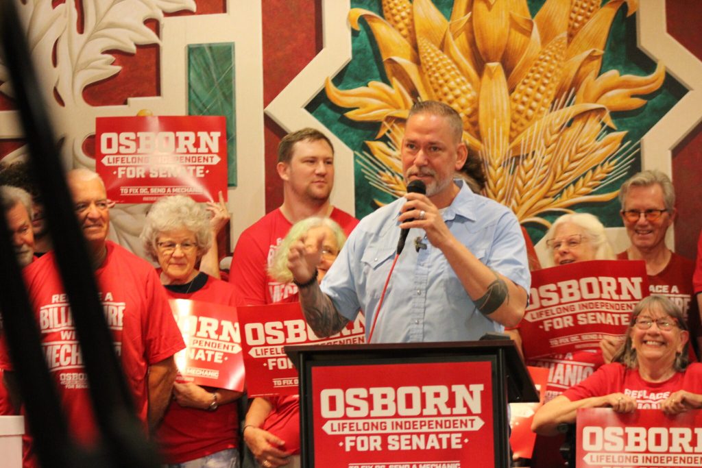 Registered nonpartisan U.S. Senate candidate Dan Osborn speaks in Lincoln on June 11, 2026. (Juan Salinas II/Nebraska Examiner)